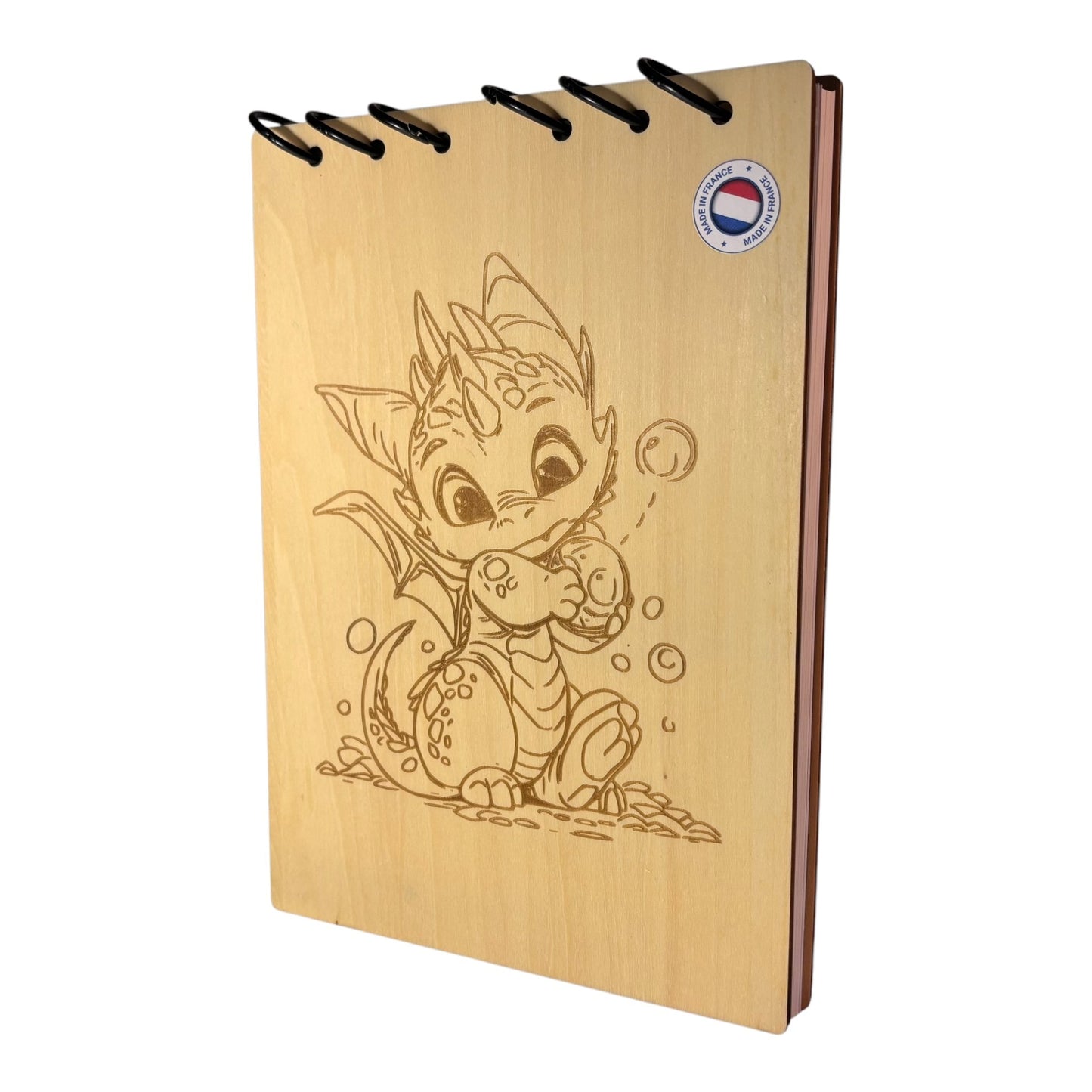 Bloc note A5 dragon avec une bulle dans les mains graver au laser rechargeable et ecologique fabrication francaise et artisanale