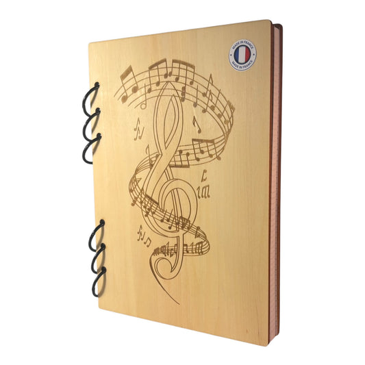 Cahier A5  Clé de sol entourée de notes de musique -graver au laser rechargeable et ecologique fabrication francaise et artisanale