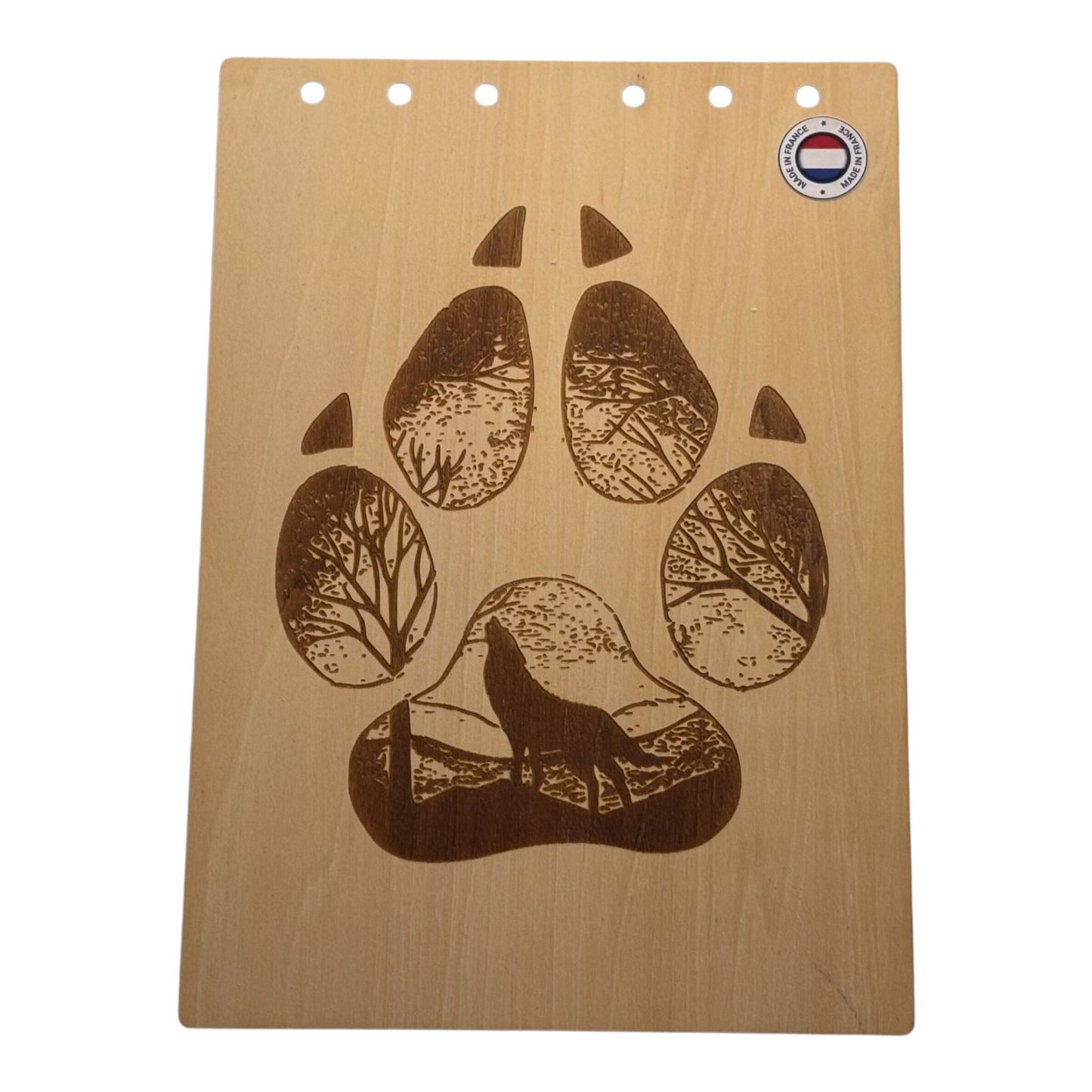 Couverture bloc note A5  Patte de loup avec silhouette de loup qui hurle dans la forêtgraver au laser rechargeable et ecologique fabrication francaise et artisanale