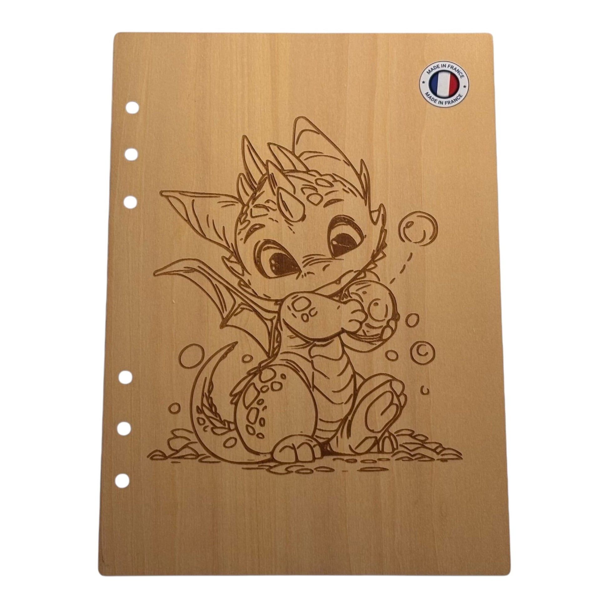 Couverture cahier A5  dragon avec une bulle dans les mains graver au laser rechargeable et ecologique fabrication francaise et artisanale